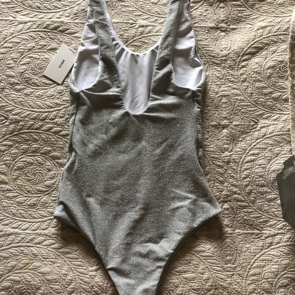 Mikoh 1 piece. Bought on sale so can’t return it. It’s too big. Tags on still